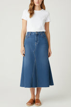 Load image into Gallery viewer, Blue denim skirt on a hanger against a white background