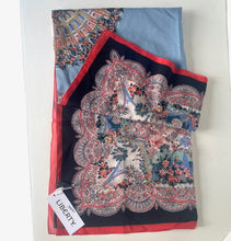 Load image into Gallery viewer, Colorful patterned scarf with a Liberty label on a white background