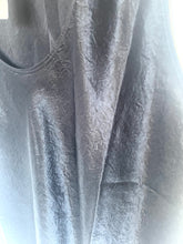 Load image into Gallery viewer, Close-up of a textured gray fabric with folds