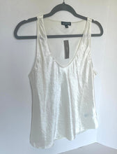 Load image into Gallery viewer, White tank top on a hanger against a white background