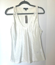 Load image into Gallery viewer, White tank top on a hanger against a white background