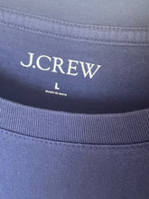 Load image into Gallery viewer, Close-up of a navy blue fabric with 'J.Crew' branding.