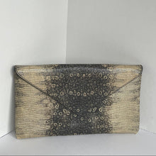 Load image into Gallery viewer, Textured clutch bag with a gradient design on a white background