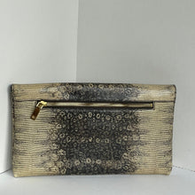 Load image into Gallery viewer, Clutch bag with textured pattern and gold zipper on a white background