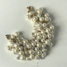 Load image into Gallery viewer, Pearl and crystal bracelet on a light gray background