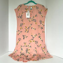 Load image into Gallery viewer, Pink floral dress on a hanger against a white background