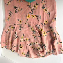 Load image into Gallery viewer, Floral-patterned pink fabric on a white background