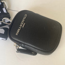 Load image into Gallery viewer, Black Karl Lagerfeld pouch with strap on a light beige background