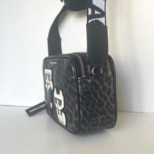 Load image into Gallery viewer, Black leopard print bag with brand tag on a white background