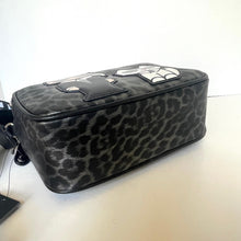 Load image into Gallery viewer, Leopard print makeup bag on a white surface