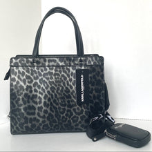 Load image into Gallery viewer, Leopard print handbag with Karl Lagerfeld logo on a white background