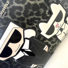 Load image into Gallery viewer, Leopard print phone case with cartoon character design on a white background