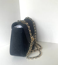 Load image into Gallery viewer, A black textured leather shoulder bag with a gold-tone chain strap, photographed standing on a white surface against a white background.