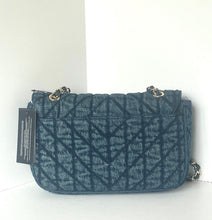 Load image into Gallery viewer, A dark blue quilted shoulder bag with a geometric monogram pattern, featuring gold-tone chain details and a black hangtag, set against a plain white background.