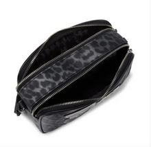 Load image into Gallery viewer, Black handbag with a leopard print strap on a white background