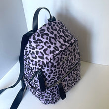 Load image into Gallery viewer, Leopard print backpack on a white surface with a light gray background