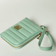 Load image into Gallery viewer, Mint green wallet with a gold zipper and brand logo on a light gray background