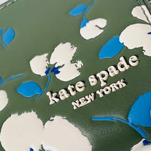 Load image into Gallery viewer, Floral patterned product with 'kate spade new york' branding on a green background
