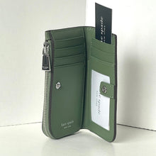 Load image into Gallery viewer, Green wallet with visible brand label on a white background