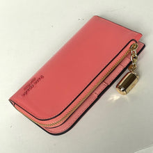 Load image into Gallery viewer, Pink wallet with gold zipper and keychain on a white background