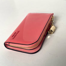 Load image into Gallery viewer, Pink wallet with gold zipper and lock on a white background