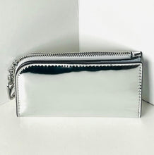Load image into Gallery viewer, Silver wallet with a zipper on a white background