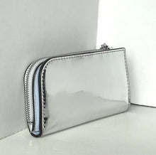Load image into Gallery viewer, Silver metallic wallet on a white surface with a light gray background