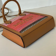 Load image into Gallery viewer, Brown handbag with a colorful woven pattern on a light background