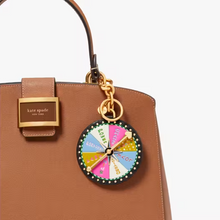 Load image into Gallery viewer, Kate Spade Fortune Favors Key Fob Keychain Bag Charm Leather Spinning Wheel