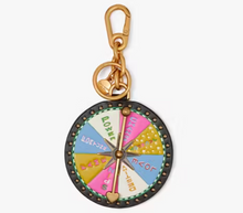 Load image into Gallery viewer, Kate Spade Fortune Favors Key Fob Keychain Bag Charm Leather Spinning Wheel