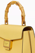 Load image into Gallery viewer, Kate Spade Katy Textured Leather Bamboo Small Top-handle Yellow Crossbody Bag