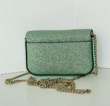 Load image into Gallery viewer, Green glittery handbag with a gold chain on a white background