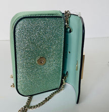 Load image into Gallery viewer, Green glittery handbag with a chain strap on a white background
