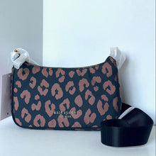 Load image into Gallery viewer, Leopard print bag with visible brand name on a white background