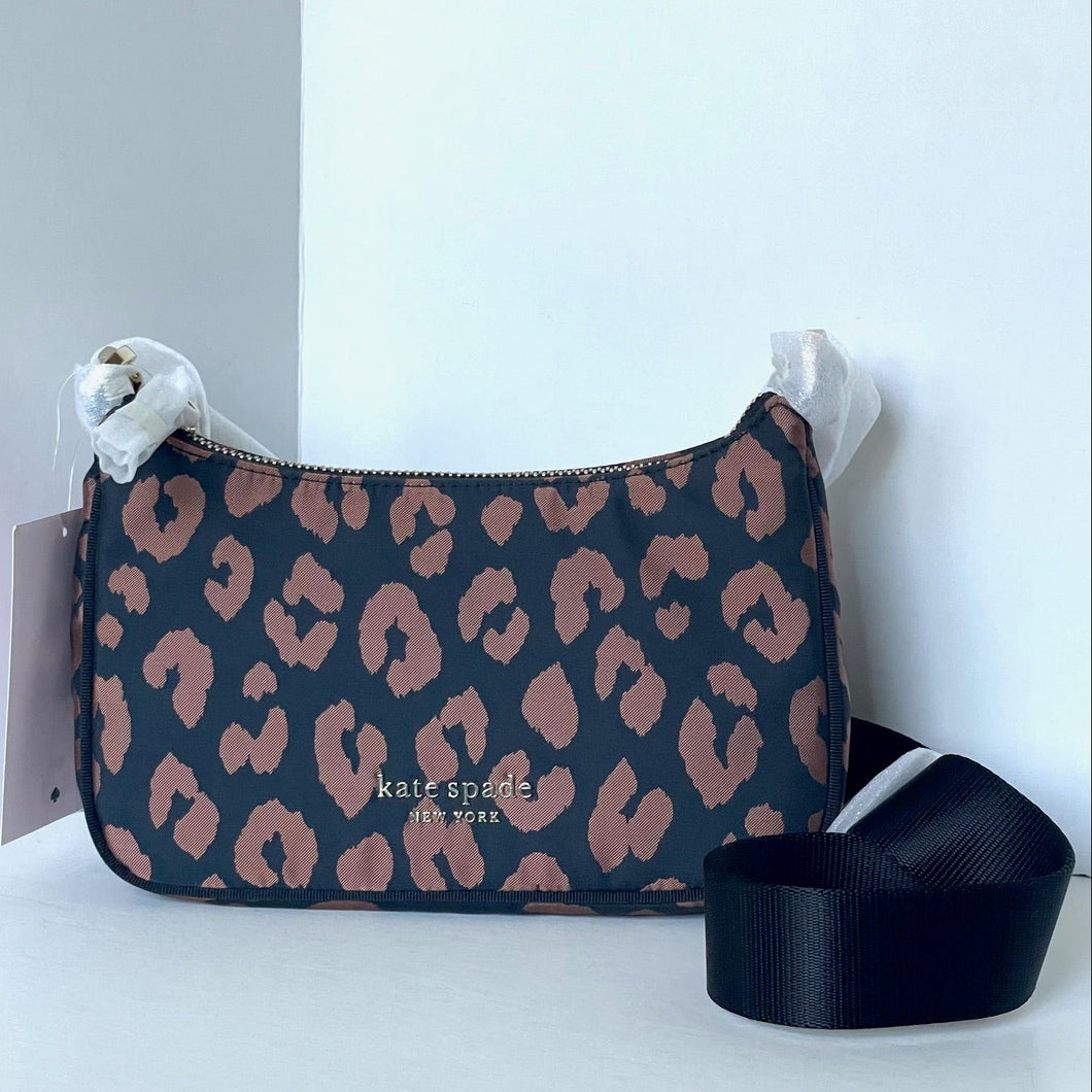 Leopard print bag with visible brand name on a white background