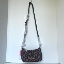 Load image into Gallery viewer, Leopard print handbag with a strap on a white background