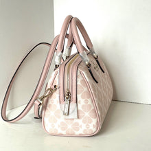 Load image into Gallery viewer, Pink handbag with a subtle pattern on a white background