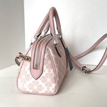 Load image into Gallery viewer, Pink handbag with a pattern on a white surface
