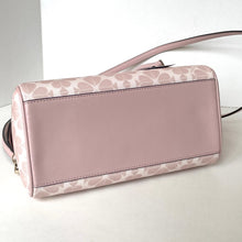 Load image into Gallery viewer, Pink handbag with floral pattern on a white background