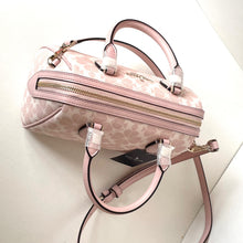 Load image into Gallery viewer, Pink handbag with gold accents on a white background