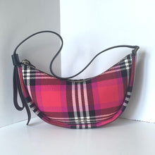 Load image into Gallery viewer, Plaid patterned bag with a black strap on a white background