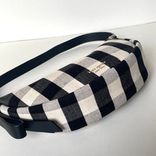 Load image into Gallery viewer, Black and white checkered belt with a visible brand logo on a white background