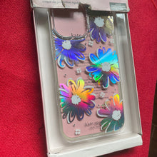 Load image into Gallery viewer, Phone case with colorful floral design in packaging on a red surface