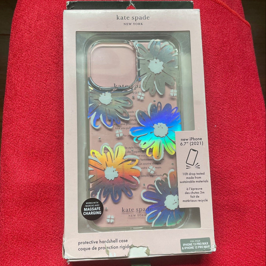 Kate Spade phone case packaging on a red surface