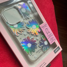 Load image into Gallery viewer, Phone case with colorful floral design in packaging on a red surface