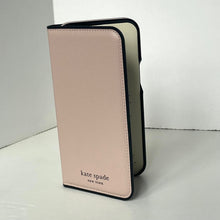 Load image into Gallery viewer, Pink wallet with black trim and 'kate spade New York' branding on a white background