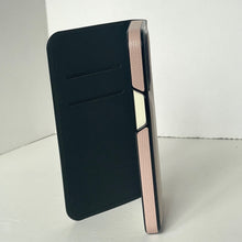 Load image into Gallery viewer, Black and rose gold lighter on a white background