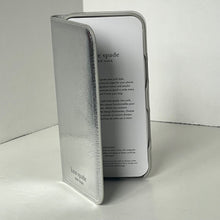 Load image into Gallery viewer, Silver phone case with 'kate spade' branding on a white background