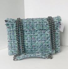 Load image into Gallery viewer, Blue textured handbag with chain strap on a white background