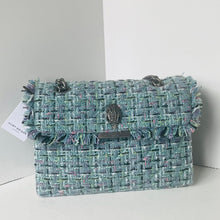 Load image into Gallery viewer, Green tweed handbag with ruffled edges on a white background